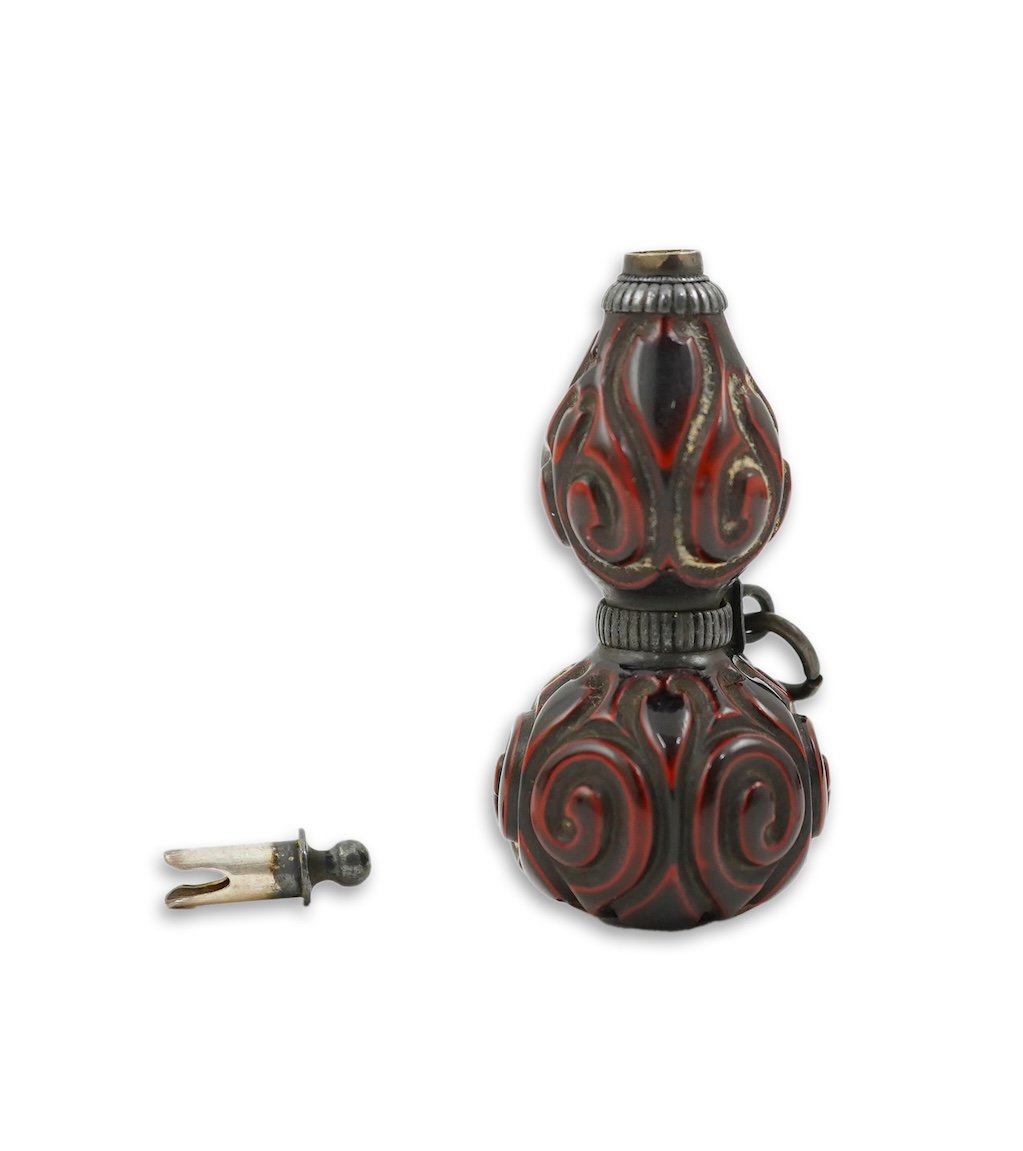 A Japanese guribori lacquer double gourd shaped netsuke, Edo period, late 18th/early 19th century